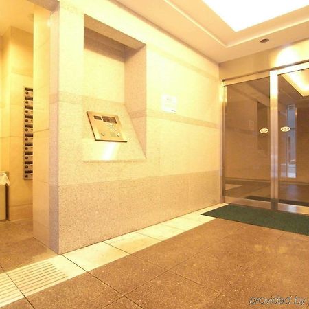 Апартаменты Concieria Shimbashi Crossia Токио Экстерьер фото